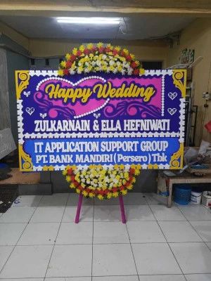 Papan Bunga di Tanggan Gesi